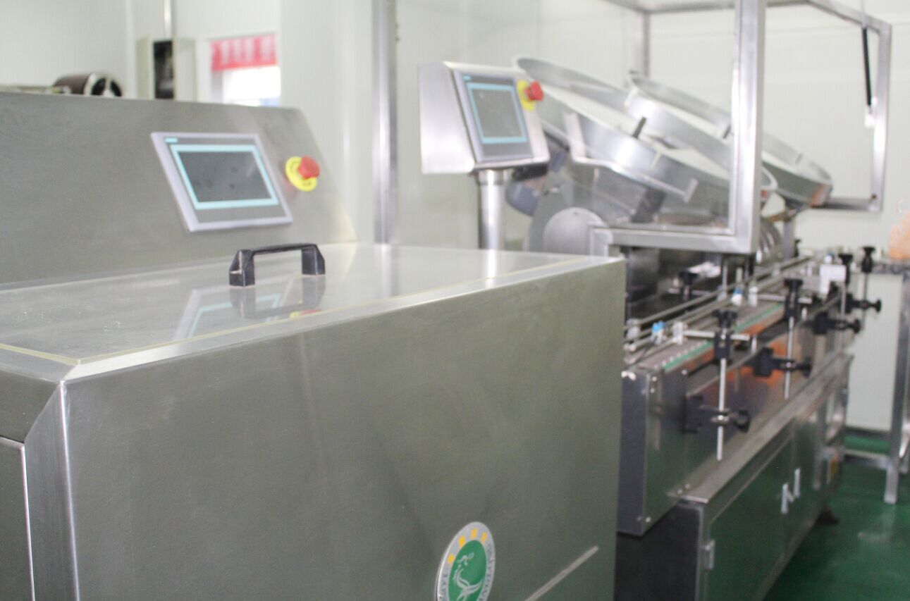 裝瓶機(jī) 裝瓶機(jī)